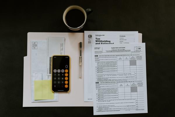 Picture of folder with accounting tools and papers